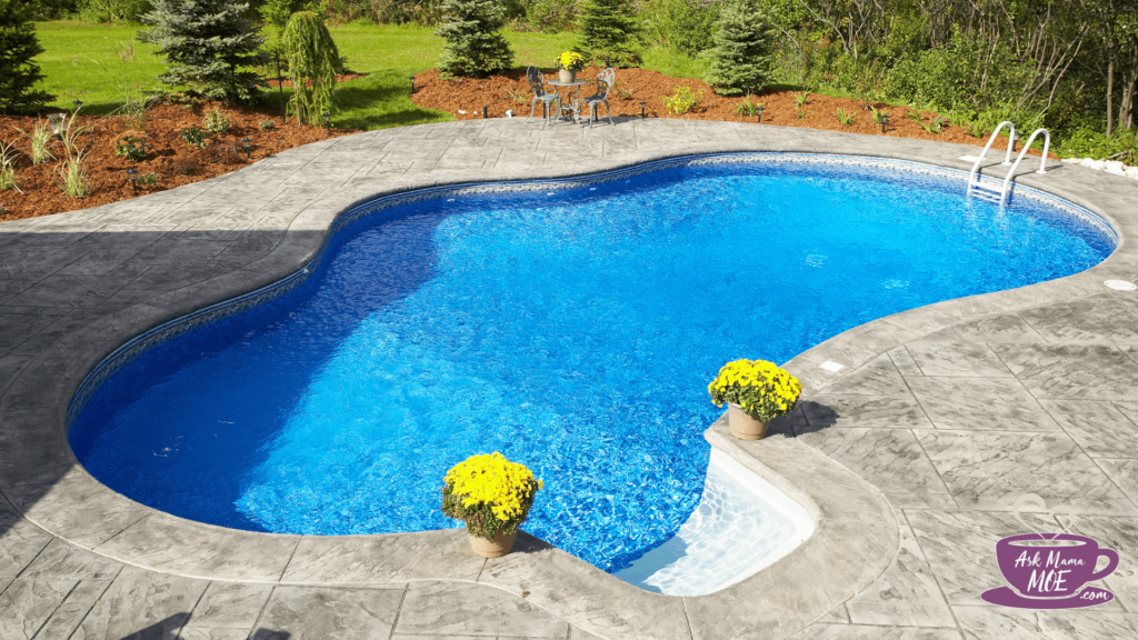 An inground pool on a sunny day